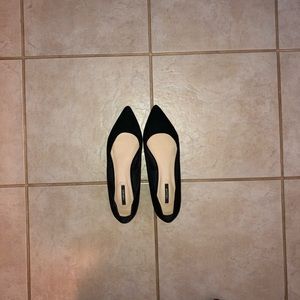 Black faux suede flats